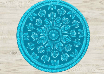 Shades of teal paints on this 8" mandala.